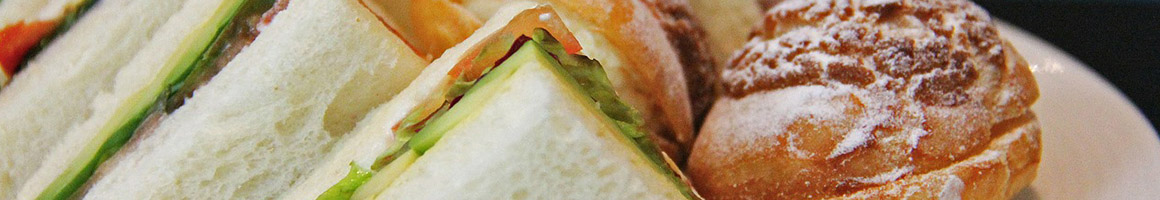 Eating Fast Food Sandwich Vietnamese at Lu's Sandwiches restaurant in Minneapolis, MN.